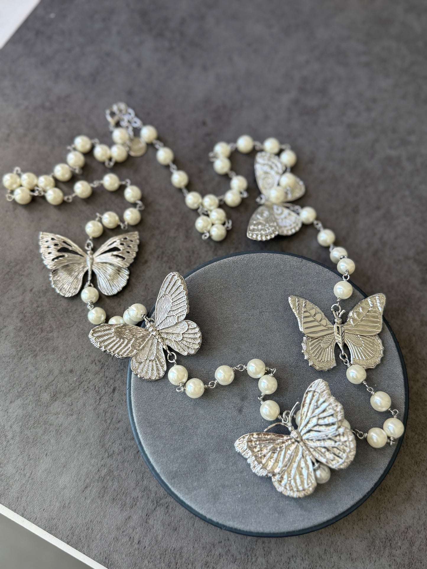CD butterfly long pearl necklace