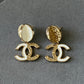 coco Gold Tone White Enamel Double C Dangle Earrings