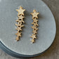 Coco Gold Stars Dangle Earrings