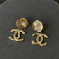 coco Gold Tone Black Enamel Double C Dangle Earrings